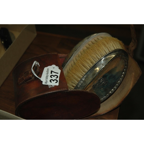 337 - Cased pair of sterling silver brushes