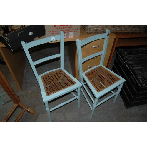 103 - Pair of painted chairs