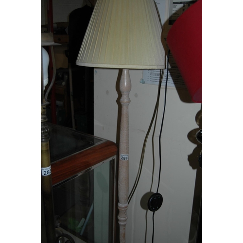 284 - Limed standard lamp