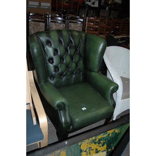 64 - Leather armchair