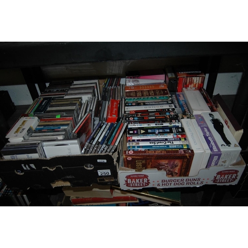 250 - 2 boxes of dvds/cds