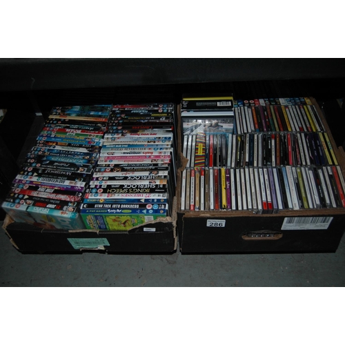 286 - 2 boxes of cds/dvds