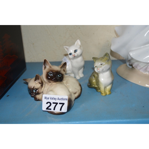 277 - 3 Beswick cats