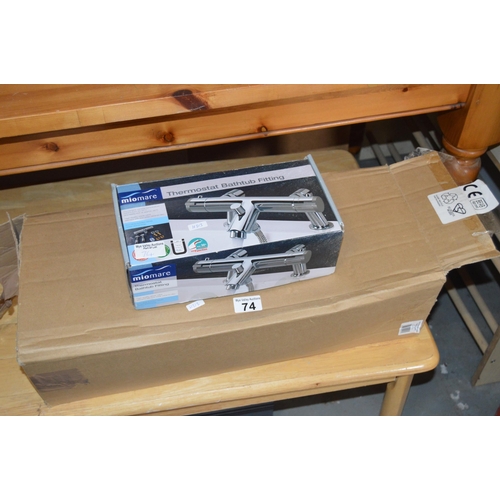 74 - Boxed, NEW, Triton power shower & bath taps