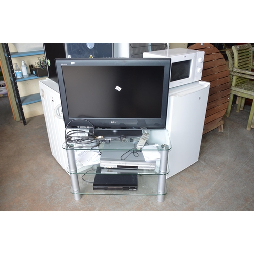 125 - Sony TV with stand & more