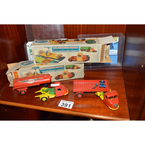 391 - 2 boxed Crescent toy lorries, diecast