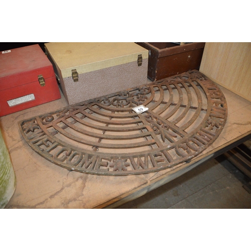 69 - Cast iron welcome mat