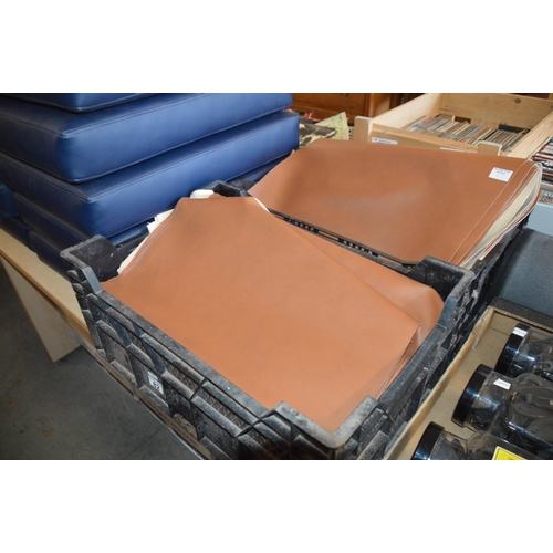 82 - 2 crates of vinyl upholstery panels