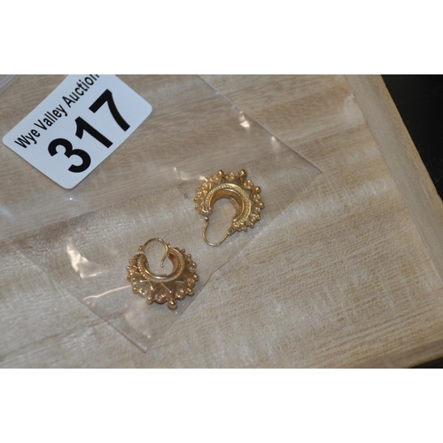 317 - Pair of 9ct gold earrings, 2.2g