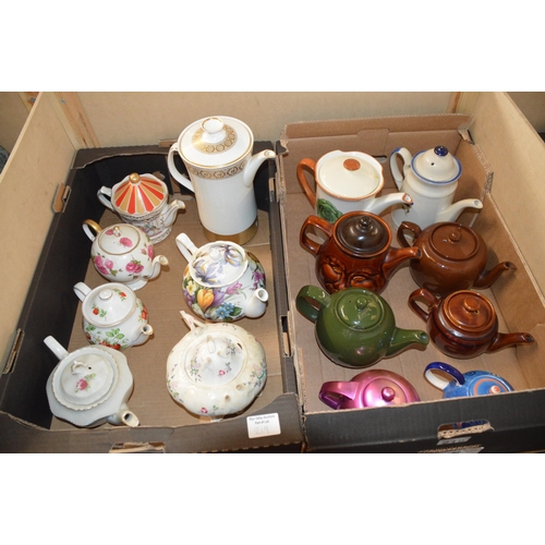 219 - 2 boxes of collectable teapots