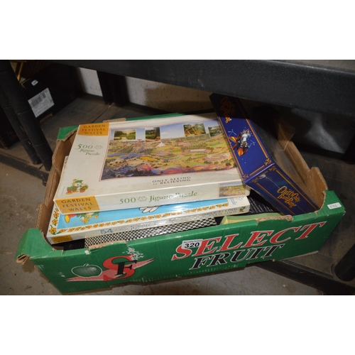 320 - Box of jigsaw puzzles