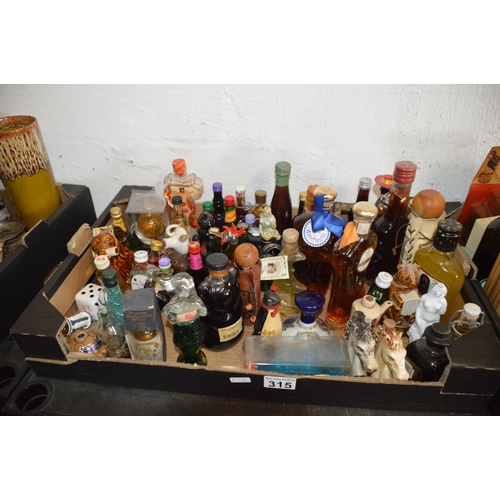 315 - Box of novelty decanters etc