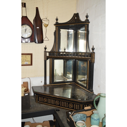 319 - Ebonised corner shelf