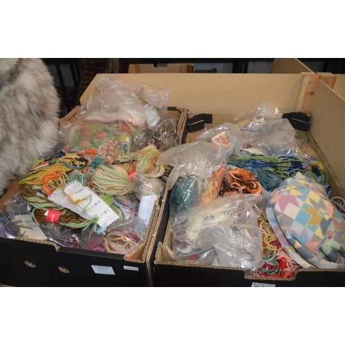 257 - 2 boxes of tapestry wools etc