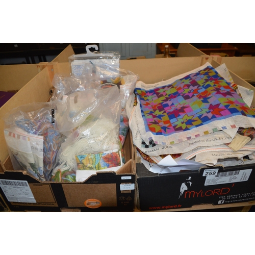 259 - 2 boxes of tapestry mats etc