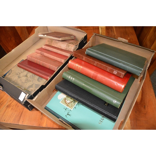 2 boxes of stamp albums & contents