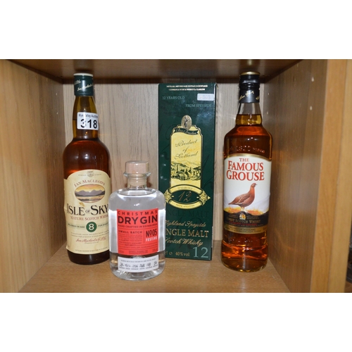 318 - 4 sealed spirits, whisky, gin...