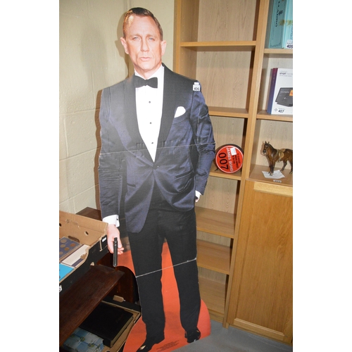 406 - James Bond, Daniel Craig life-size cutout, with cased set of 007 audio book cds