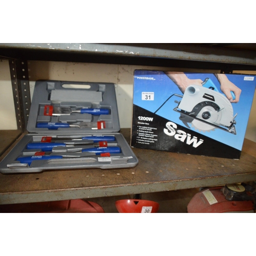 31 - boxed power saw & case of chisels