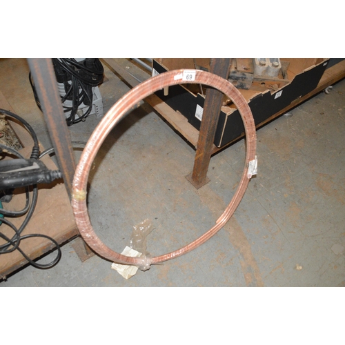 69 - coil of copper pipe