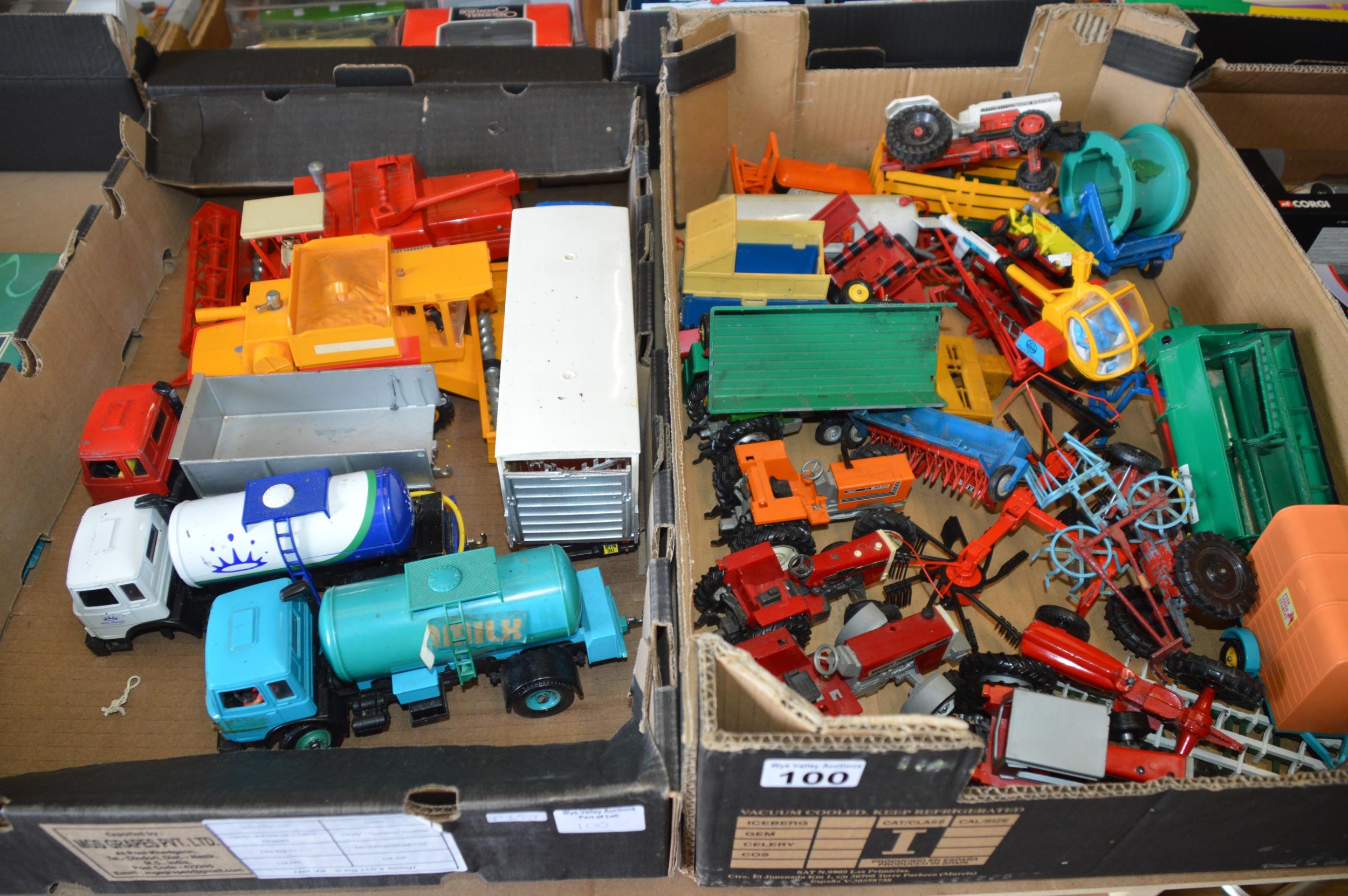2 boxes of Britain's toy tractors etc