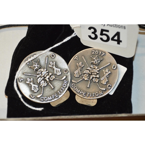 354 - 2 x sterling silver medallions