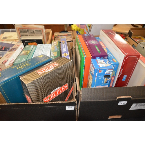 76 - 2 boxes of games