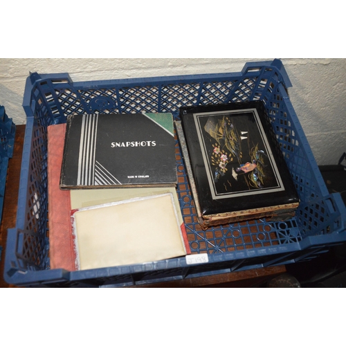 425 - basket of vintage photographs in albums