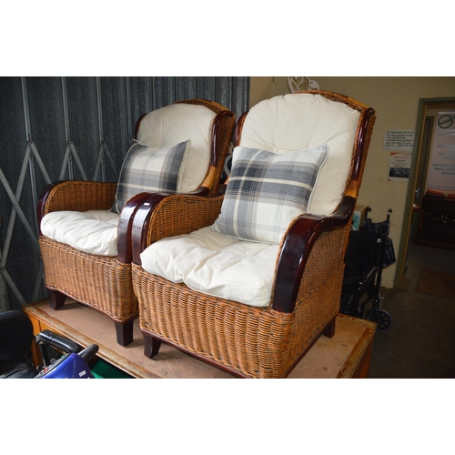 132 - pair of cane chairs