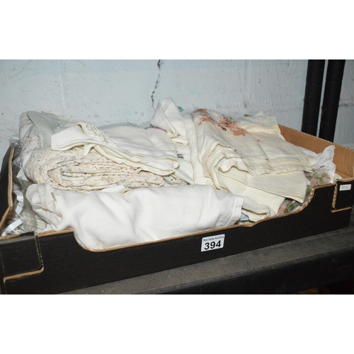 394 - box of linen etc