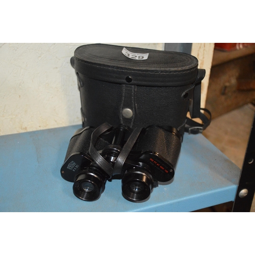 329 - cased Prinz binoculars