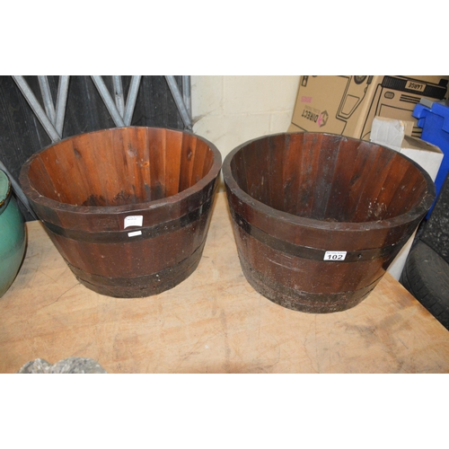 102 - pair of wooden planters