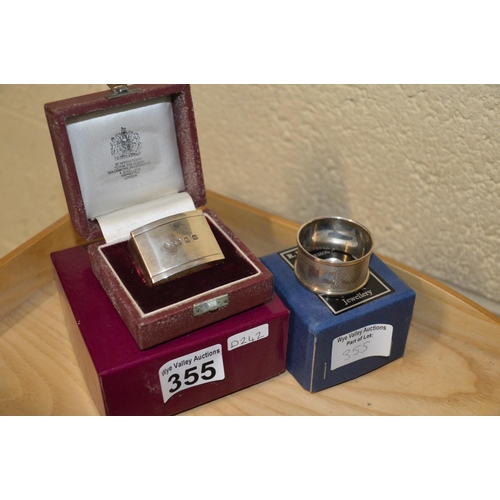 355 - 2 cased silver napkin rings