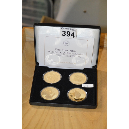 394 - cased set of 4 x £5 coins