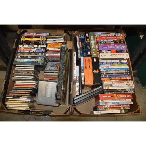 389 - 2 boxes of dvds/cds etc.