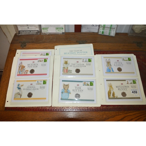 459 - 12 x beatrix potter uk coin cover collection -