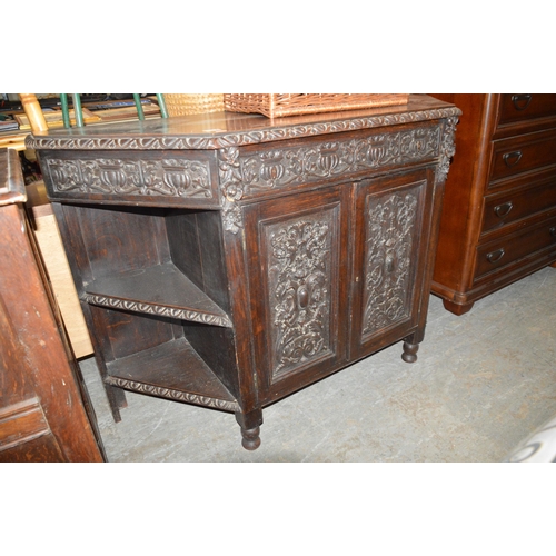 194 - carved wood cupboard