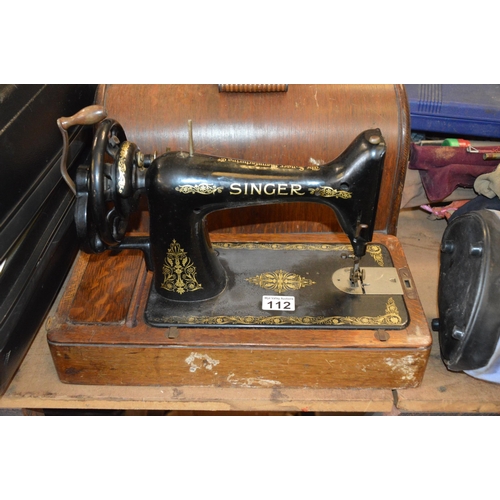 112 - singer sewing machine