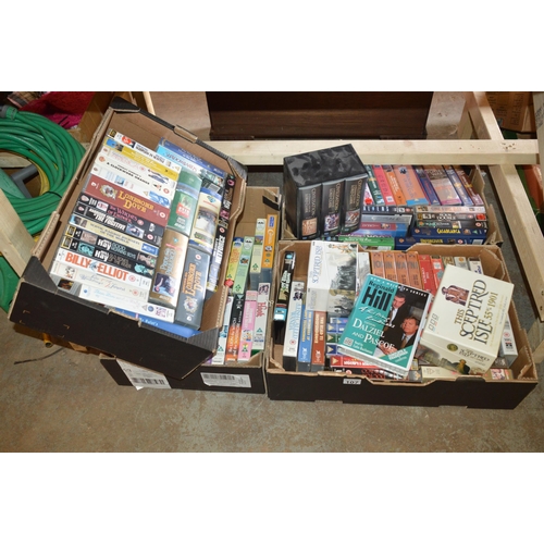 107 - 4 boxes of audio books/vhs videos