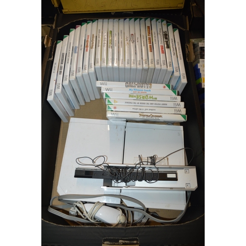 83 - 2 nintendo wii consoles & games