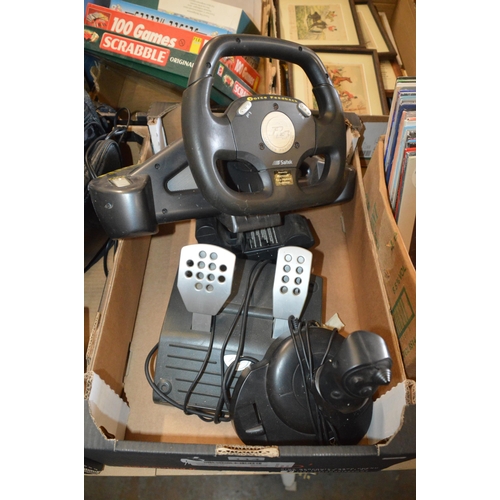 114 - games console steering wheel etc.