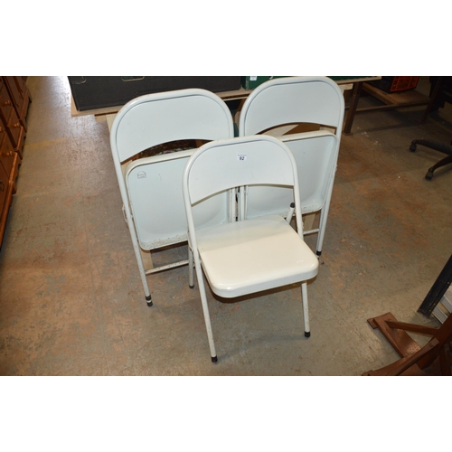92 - 3 metal fold out chairs