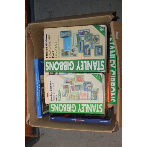 393 - box of stamp catalogues