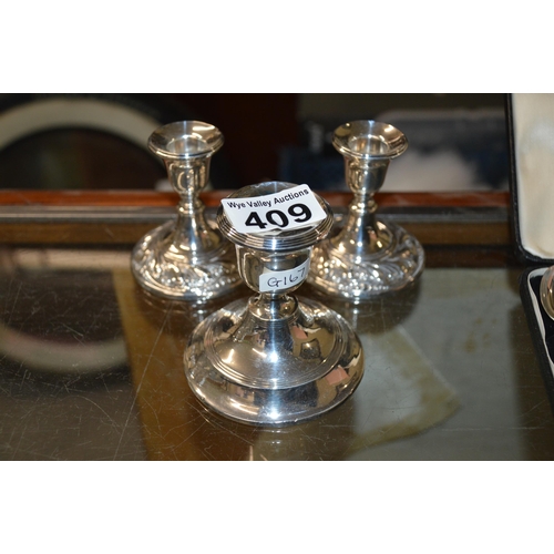 409 - 3 silver candlesticks