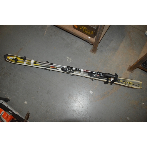 66 - pair of downhill skis & poles