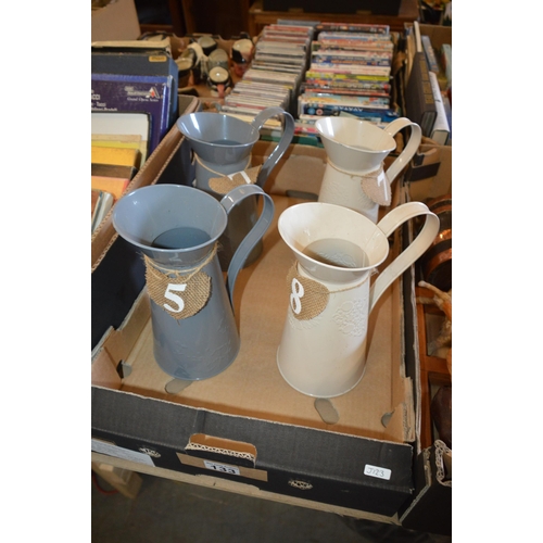 133 - box of metal jugs