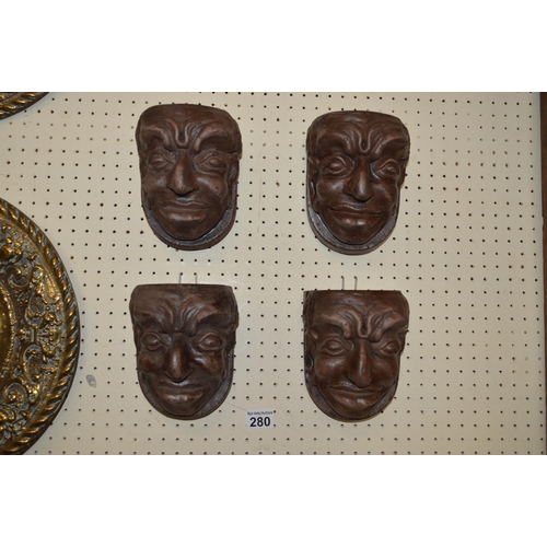 280 - 4 carved wood faces