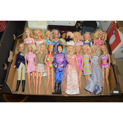 111 - box of barbie dolls