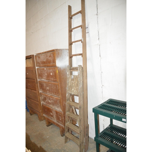 2 wooden ladders