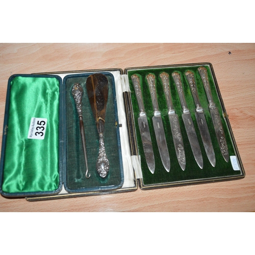 335 - 2 cased sets of silver handled items